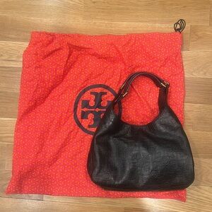 Like New with dust bag Tory Burch monogram embossed small shoulder bag